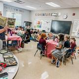 Madison Academy Photo #1 - Second graders learn about Johnny Appleseed and taste test different varieties of apples.