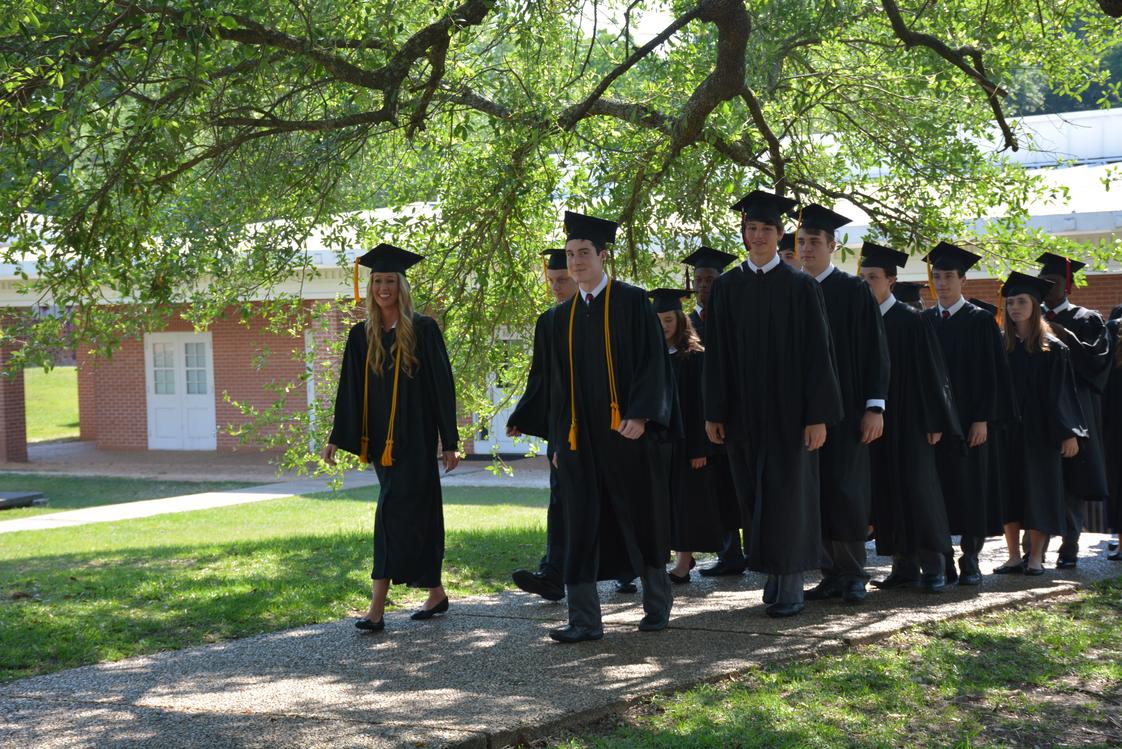 St. Luke's Episcopal School Photo - St. Luke's seniors parade the campus one last time before their commencement ceremony.
