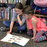 Grace Christian School Photo #2 - Kindergarten reading buddies!