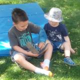 Community Montessori School Photo #3 - Helping little friends.
