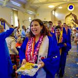 Living Wisdom School Of Palo Alto Photo #16 - Living Wisdom students celebrate graduation as they walk down the aisle surrounded by family, friends, and flower petals.