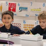 Berkeley Hall School Photo #10 - Kindergarteners in a math lesson learning counting skills.