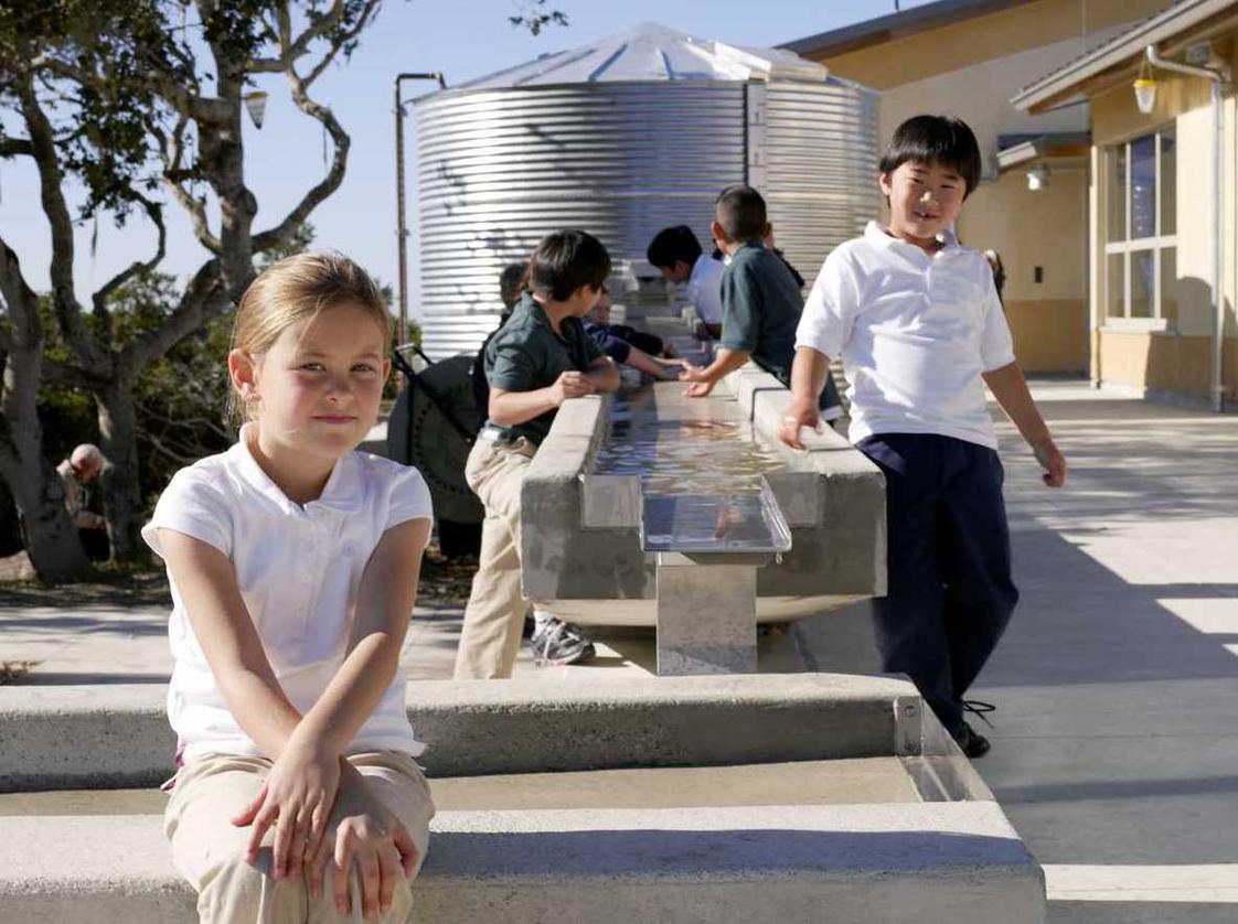 Chartwell School Photo - The green campus serves as a teaching tool. Here, students in science class learn about the rain catchement system and cistern, which collect water for flushing toilets, watering the field, and watering the student garden.