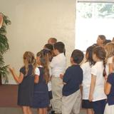 Grace Harbor School Photo #4 - Mrs. Snyder leads weekly chapel in Fellowship Hall. School begins each week learning a new Bible lesson and singing with Mrs. Snyder.