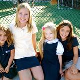 Del Mar Pines School Photo #8 - At Del Mar Pines School, we believe in the buddy system. Each Kindergartner is partnered with a 6th grader and each 1st grader with a 5th grade student. They do activities and projects together and learn and laugh together. They are buddies in every way.