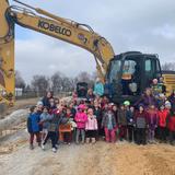 Highland Christian School Photo #2 - When school meets real life, it's always more fun! Our Kindergarten classes are reading the book Roadwork - what a treat it was to see a real live excavator up close!
