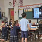 St. Louis School Photo #3 - First grade learning about the rosary