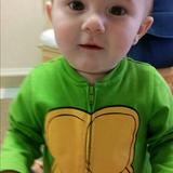 Madison KinderCare Photo #9 - One of our infants having a good time in his Ninja Turtle outfit in our Infant Classroom.