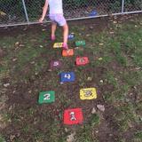 Rangeline KinderCare Photo #8 - Preschoolers helped to make our playground hopscotch and are clearly proud of it as they recall making it to parents and staff weekly.