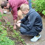 Hillcrest Academy Photo #4 - Learning "outside" of the classroom. Hillcrest Academy has a wonderful 17 acre campus and we like to use every square inch of it. This fall one of our science classes and FFA Club participated in planting fruit trees extending the size of our orchard.