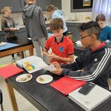 Berean Academy Photo #11 - Junior High students working on a science lab.