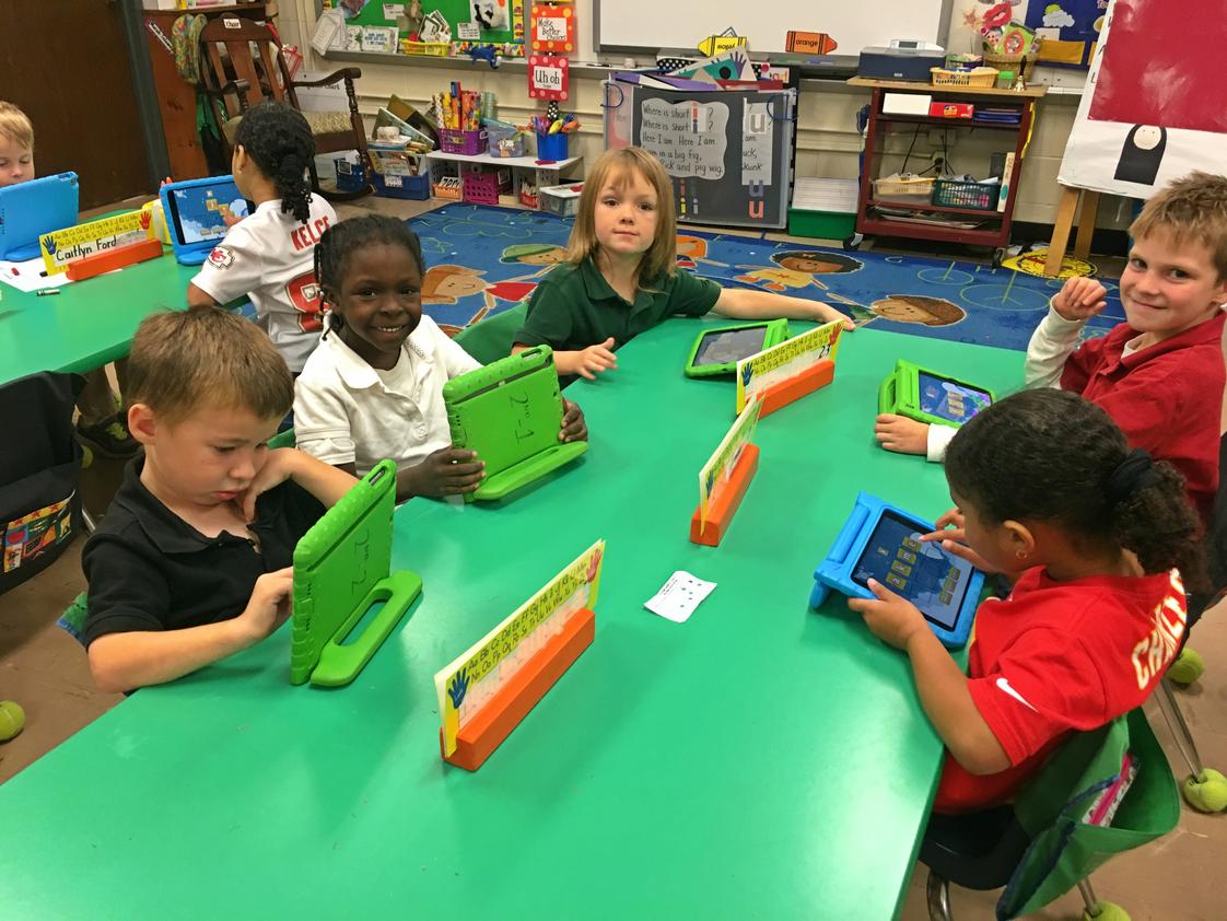 Xavier Catholic School Photo - Kindergarten students using iPads during class.