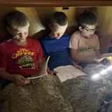 The Frankfort Christian Academy Photo #2 - Third Graders reading on Flashlight Fridays