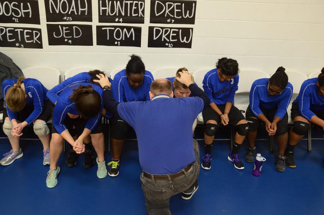 Oakdale Christian Academy Photo - Praying before playing