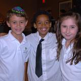 Jewish Community Day School Photo - Second Grade Students enjoy Chanukah together after their annual Chanukah School Musical program.