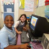 St. Anthony School Photo - First graders use computer skills.