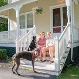 Kents Hill School Photo #9 - Head of School, Dr. Molly T. MacKean, with her husband, Jason, and their two dogs, Big Tuna and Orlaith. Kents Hill School Photo #9 - Head of School, Dr. Molly T. MacKean, with her husband, Jason, and their two dogs, Big Tuna and Orlaith.