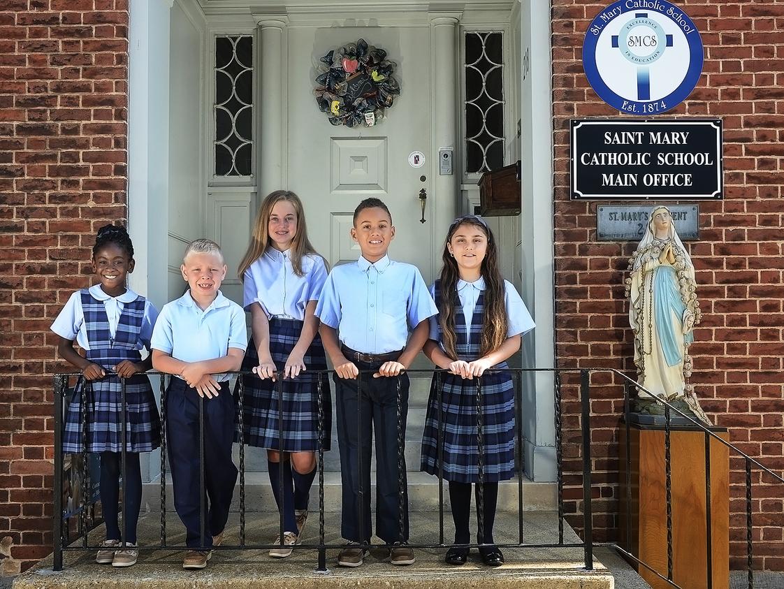 St. Mary Catholic School Photo #1 - St. Mary Catholic School students extend an open invitation for you to witness a faith-filled education behind these doors.