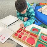 Andover School Of Montessori Photo #6 - Lower Elementary math work: Fractions