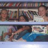 Greenfield Center School Photo #2 - 4th & 5th grade students read in the classroom loft. The day's schedule includes small group work, collaboration, project exploration and experiential, inquiry-based learning. It also includes quiet, individual time for students to regroup and refresh.