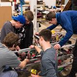 Whitinsville Christian School Photo #6 - The highly successful Robotics Club provides real-world, hands-on learning opportunities for our Robotics team members. The off-campus Robotics lab provides a tremendous venue to learn construction, programing, and testing of robots. Participating in several competitions per year through the FIRST program helps team members hone their talents and develop critical thinking and creative collaboration skills.