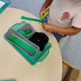 Christian Montessori School Of Ann Arbor Photo #18 - Small muscle concentration in the Young Children's Community classroom.