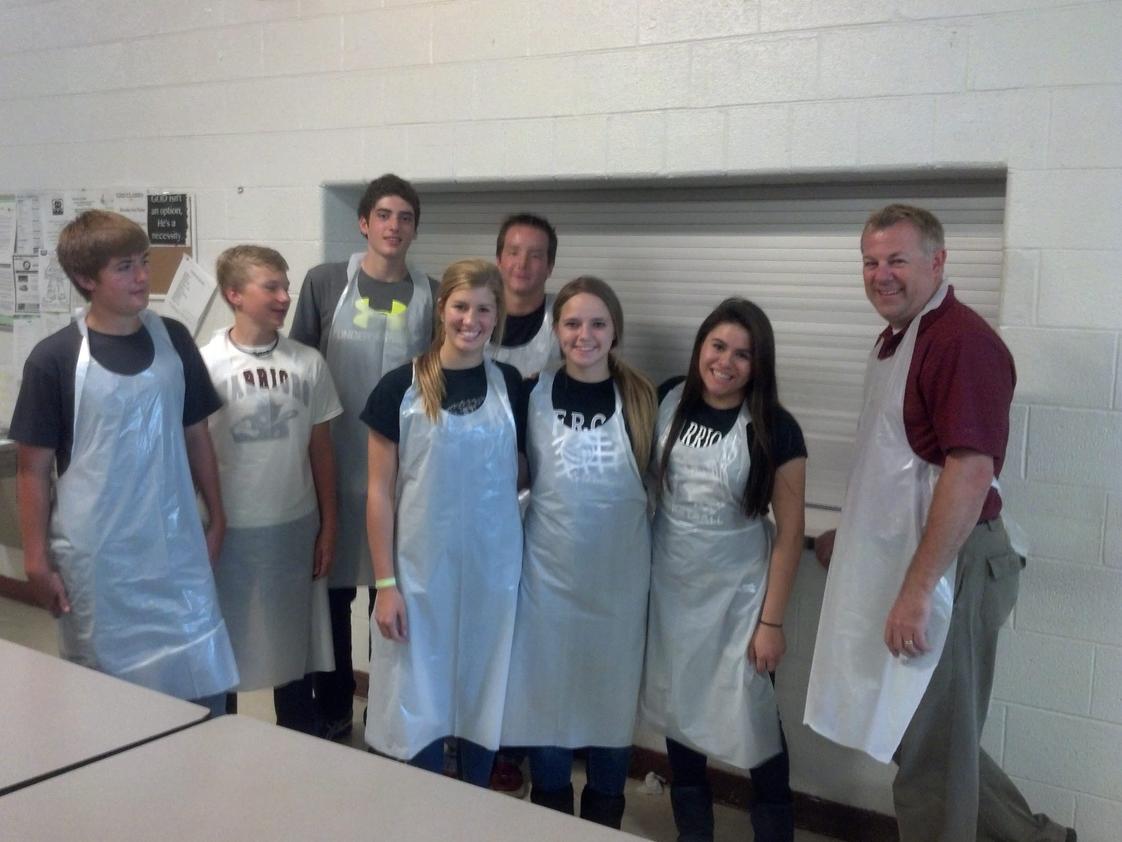 Novi Christian Academy Photo - Each year, FRCS students and staff dedicate an entire day to community service. This group served at Detroit Rescue Mission for the day. In addition, graduates must complete a minimum of 40 hours of community service for graduation.