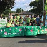 Little Voyageurs Montessori School Photo #3 - LVMS participated in the Columbia Heights parade, we had over 50 family members help to support our school and the community.