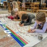 White Bear Montessori Photo #4 - Elementary Years: The Montessori Method is a research-based curriculum that encourages children ages 6-12 to follow up on materials introduced by the guide and to conduct research on subjects that the children choose. They explore various facets of chosen subjects through research, individually or in small collaborative groups. Classrooms are multi-age, so peer learning and mentoring opportunities can unfold.