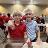 Christian Fellowship School Photo #6 - We pack 50,000 meals for the hungry in one day!