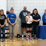 St. John Lutheran School Photo #2 - A 5th-grade student begins St. John's home volleyball tournament with prayer.