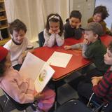 Jewish Community Day School Photo #6 - Lower School students enjoy reading and listening to their classmates.