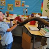 Jewish Community Day School Photo #2 - This Lower School student is getting ready for Rosh Hashana by practicing his Shofar skills!