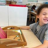 The Red Oaks School Photo #2 - Our Early Childhood program is pure Montessori. Here's a child using the quintessential sandpaper letter activity. Curious? Visit Red Oaks.