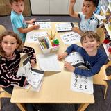 The Red Oaks School Photo #3 - Lower Elementary (Grades 1 and 2) students are busily at work. Having already developed a strong foundation of early literacy and mathematical skills, our elementary students' excitement about learning is truly infectious.