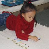 New World Montessori School Photo #9 - Learning numbers and counting are practiced using concrete materials.