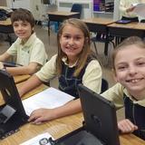 Sacred Heart Elementary School Photo #6 - 3rd graders hard at work on their iPads!