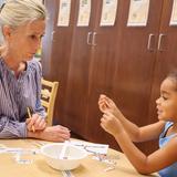 Buckley Country Day School Photo #5 - Pre-K students build early literacy skills through hands-on activities and individualized guidance from their teachers.