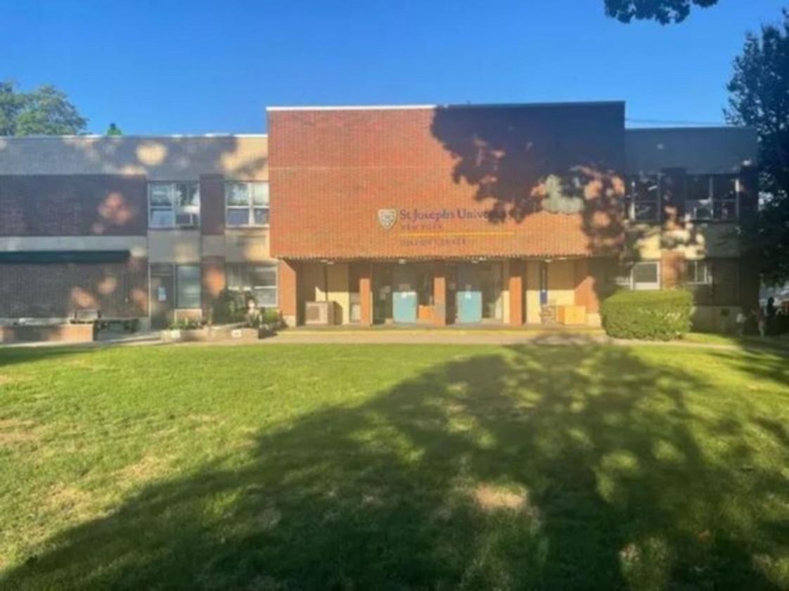 The Dillon Child Study Center Photo #0 - This is the front of the Dillon Child Study Center, plus part of our beautiful grassy area where children play once in the morning and once in the afternoon.