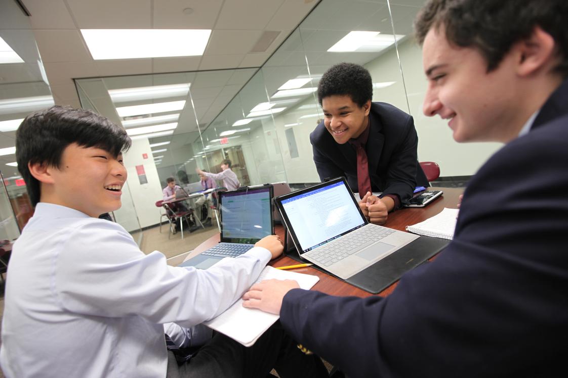 Fordham Preparatory School Photo - As a "One to One" computing school, all students are required to have a laptop of table in each class.