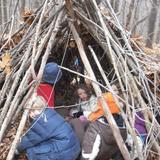 Mountain Road School Photo #4 - Flying Deer, the students in a shelter they have made