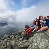 Northwood School Photo #9 - Students enjoy frequent opportunities to explore the Adirondack Mountains which surround Northwood's campus. Here students enjoy the view after a hike to the summit of Whiteface Mountain as part of Mountain Day.