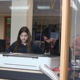 Kirby School Photo #11 - A student watches her project come to life in the FabLab.