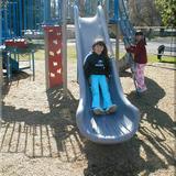Grace Lutheran Preschool Photo #4 - Two third graders enjoying our upper grade playground equipment. Brand new equipment was installed in the lower grade and upper grade playgrounds over the summer of 2004. The lower grade playground had still more equipment installed during the 2004-05 school year.