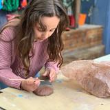 Katherine Michiels School Photo #5 - Working with clay in the Outdoor Workshop.