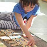 Montessori Of Brea Photo #2 - 3 year old working on the Decimal System
