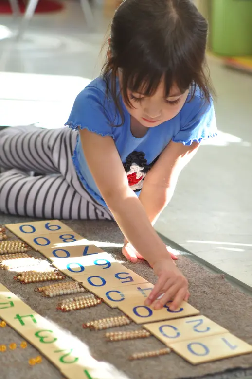 Montessori Of Brea Photo #2 - 3 year old working on the Decimal System