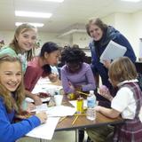 St. John School Photo #2 - Girls from Grade 6 enjoying Family Fun Math Night.