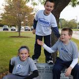 Immaculate Heart Elementary School Grades Photo #6 - IHC is a tight-knit faith community of students, parents, faculty, alumni, and friends. Here, some of our younger students clown around at the High School on Saturday morning, as their parents and older siblings join in the IHC 5K Family Fun Run, which benefited our Athletic Booster Club.