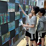 Transfiguration School Photo #19 - Appreciating classmate's artwork